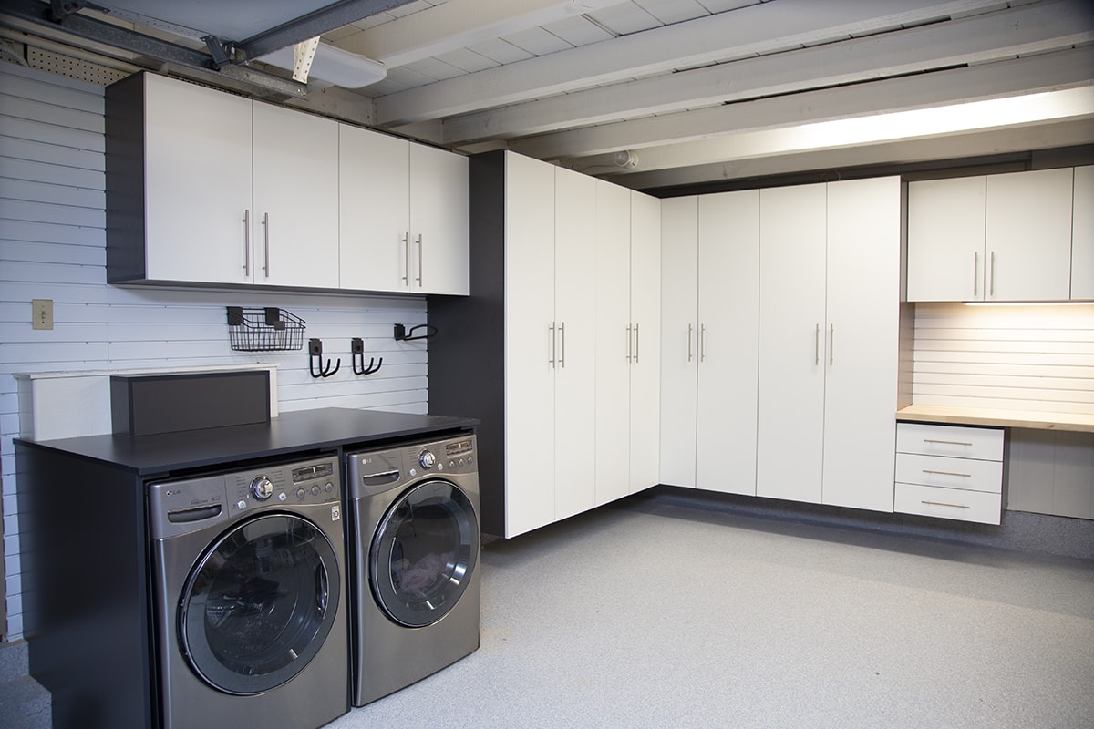 custom-garage-cabinets-add-organization Ultimate cabinets from Garage Excell, which are made from a combination of an engineering wood composite called MDF (medium density fiberboard) and particle board